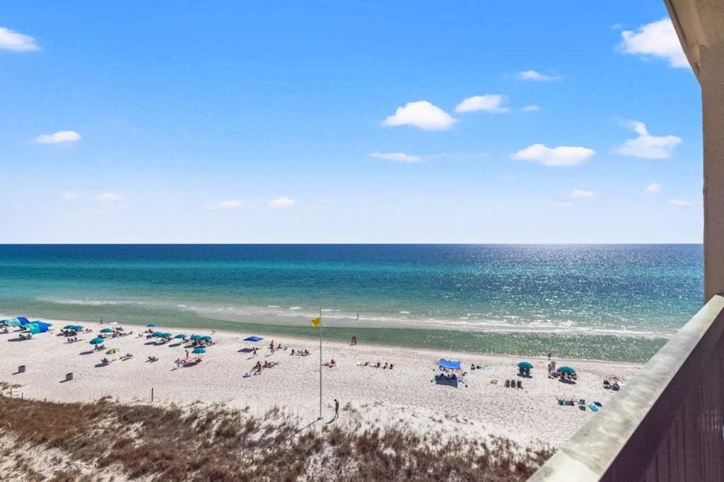 Sunnyside House | Beachview Condo with full kitchen shared pool and beach access