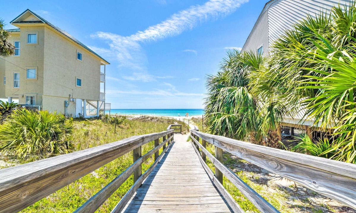 West Panama City Beach Apartment | Beautiful PCB Townhome: Balcony & Resort Amenities