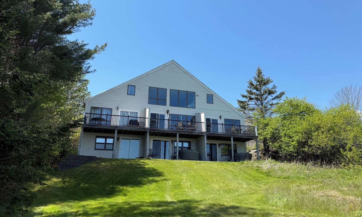 Southwest Harbor Condo | Enjoy the stunning ocean view from the hot tub at Port!