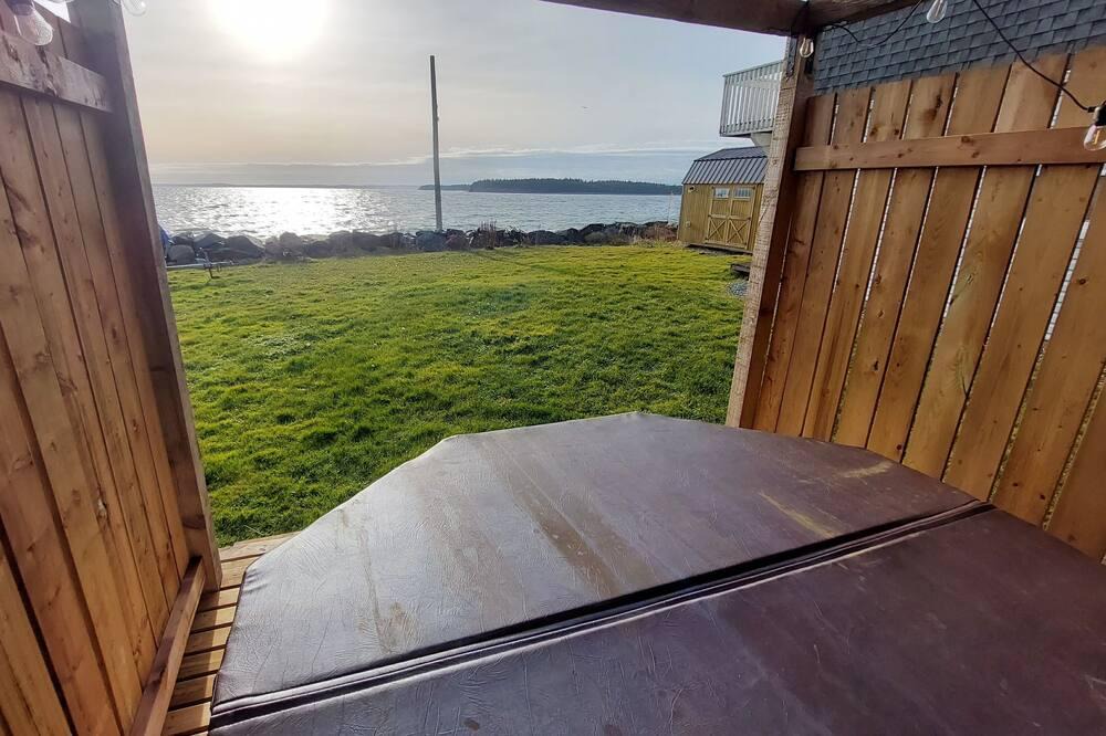 Eastern Passage Apartment | Seafront suite with year-round hot tub.