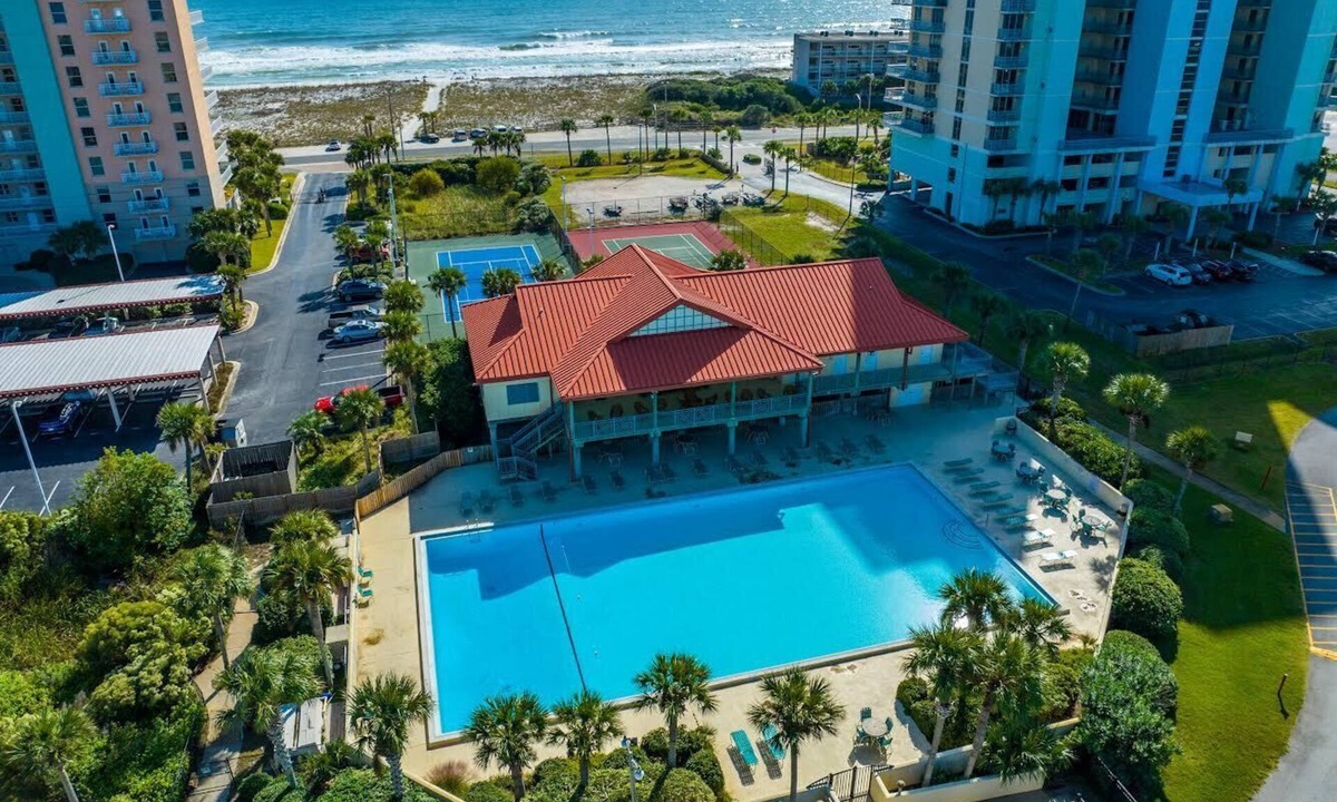Villa Sabine Condo | Water Views, Perfect Location, Large Pool, Courts and Private Fishing Pier!
