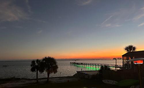 Navarre House | Waterfront Master Suite with Views of Barrier Island