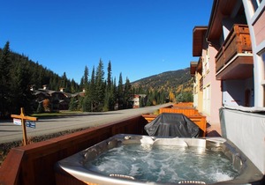 Multi level 3 bedroom condo with easy access to ski runs and view of Mt. Morrisey in Sun Peaks