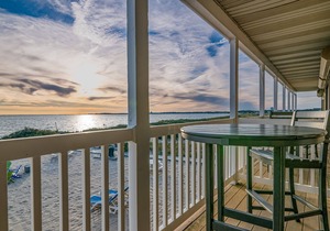 Oceanfront escape with full kitchen, bay-view balcony, AC & firepit