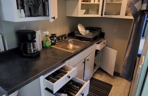 Aloha House | 2 bedroom/1 bath entire house across from the food trucks of the Aloha mall!