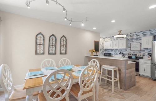 Siesta Key Condo | Bayfront Balconies in Tropical Siesta Key with Sunrise Views & Walkable Beach Access