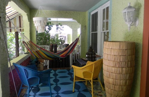 East Little Havana House | Beautiful & Large Bedroom in B&B in Exquiste Tropical Home- Centrally located