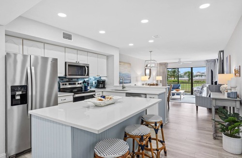 Sandestin Condo | "Bella Vue" - 5 Star Premier Hosts, with Golf Cart, Marina/Fireworks View