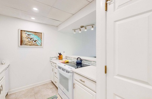 Villa Sabine Condo | Charming coastal condo with water views, great location, balcony, WiFi, A/C