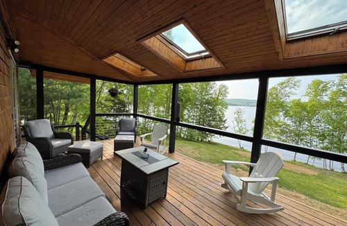 Baileyville Cottage | Charming lake front 2-bedroom cottage in serene Alexander with WiFi, AC