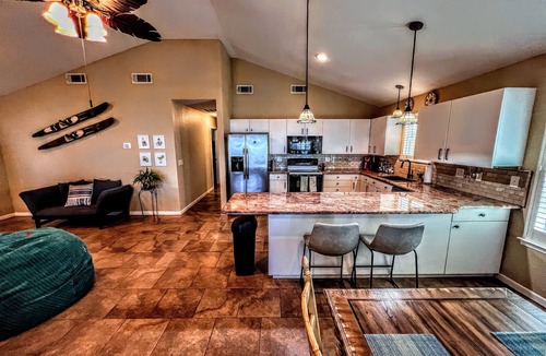 Leisure Land House | Charming Lake House Retreat with Private Dock & Expansive Covered Porch