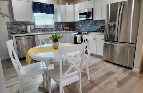 Navarre Cottage | Cottage with awesome outdoor living area 5 minutes to Navarre Beach!
