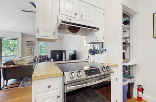 Quechee Condo | Cozy condo w/balcony, river view, electric woodstove, w/d, wifi, kitchen, a/c