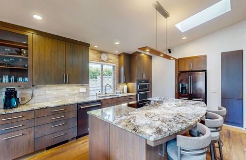 Blue Heron House | Delightful Retreat with Water Views, Fast WiFi, Gas Grill, & Furnished Patio