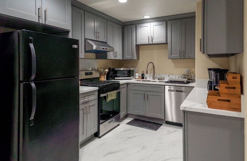 Midway City House | Disney Luxe 3BR Family Home King Beds Game Room + EV Charger