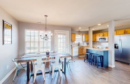 Bentonville House | Dog-friendly charmer with an enclosed yard, fireplace, jetted tub, W/D, and AC