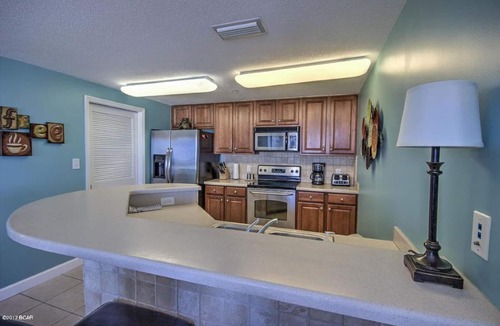 Lower Grand Lagoon Condo | End Unit! Wrap-around balcony! Free Beach Service. July 25th-Aug 1st On Sale