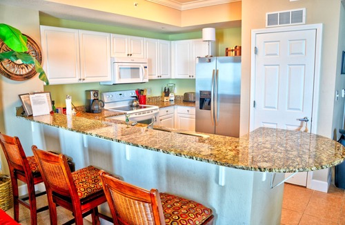 Panama City Beach Condo | From Coffee to Cocktails-Affordable Luxury for your beach getaway-Incls Chairs!