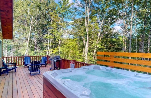 Carrabassett Valley Cabin | Gorgeous dog-friendly cabin with great view, deck, hot tub, & gas fireplace