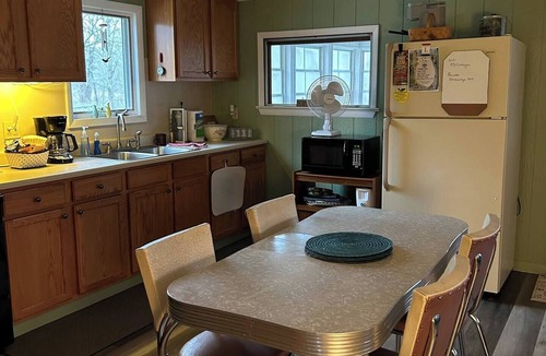 Fishertown Cottage | KD Cottages Private 2-bedroom tan cottage on Dunnings Creek, in Bedford County