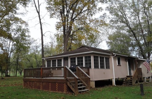 Fishertown Cottage | KD Cottages Private 2-bedroom tan cottage on Dunnings Creek, in Bedford County