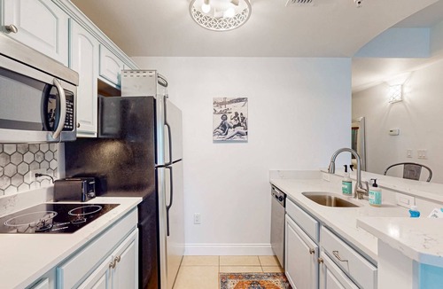 Sunnyside Apartment | Lakefront resort condo with heated outdoor pool, hot tub, balcony, lake views