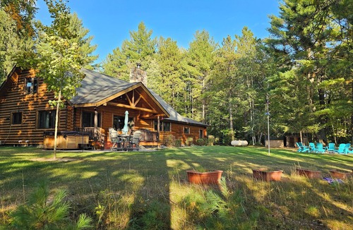 Pembine Cabin | Luxurious Northwoods Log Lake house with over 500ft of lake frontage on 15 acres
