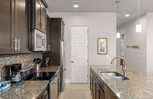 Villa Lago House | Luxury 4BR Villa Lago w/6-Seat GOLF CART! Near Village, Pool, Tram Included!