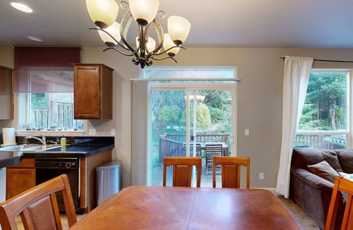 Netarts House | Modern Ocean Highlands home with Netarts Bay and ocean views fireplace dogs OK
