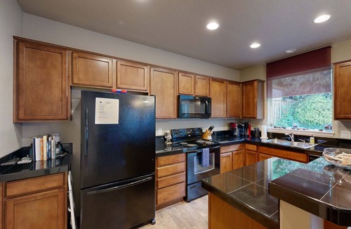 Netarts House | Modern Ocean Highlands home with Netarts Bay and ocean views fireplace dogs OK
