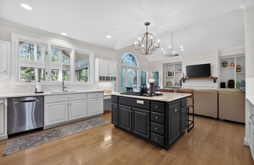 Sea Pines House | Newly updated home w/multiple living spaces offers pool, lagoon & golf views