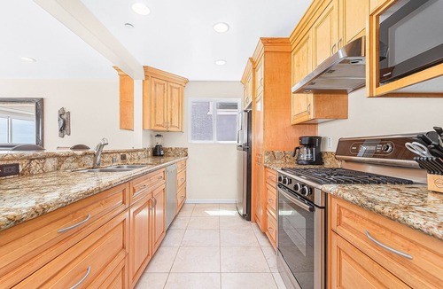 Balboa Peninsula House | Oceanfront Upper Level Retreat in the Coveted Pier to Pier Location