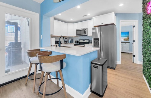 Riviera Beach House | 🏰🌴Private Heated Pool, Putting Green | .5 Mile to Beach | The White Sandcastle