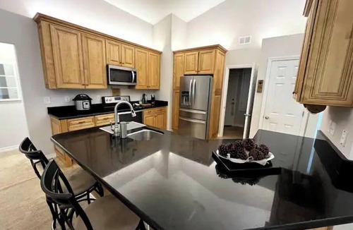 Mary Esther House | Quiet Home! Peaceful neighborhood with water access, king bed, screened porch.
