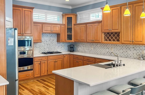 Village of Sugar Beach House | Remodeled 5 bedroom house with bikes – walking distance to the beach