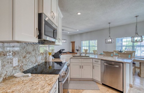 Palm Harbor House | Riverfront, Pool, Dock, Pool Table, River