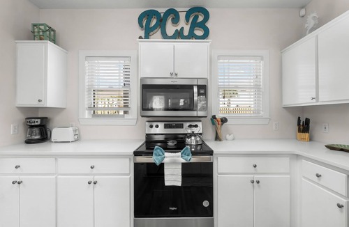 Bel Air House | Spacious Beachside Townhouse with Lagoon access, 2 car garage, and a pool!l