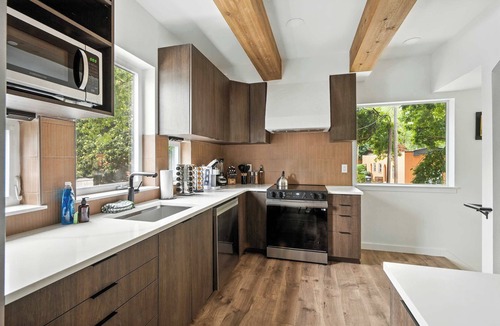 Kerns House | Spanish Revival Escape - Brand New 6BR in Heart of Kerns