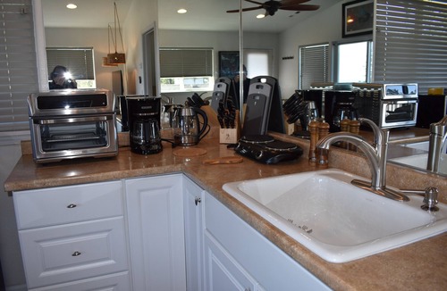Harbor Cottage | The Blue Bird A Luxury Cottage with Deck and Peek a Boo Views of Ocean