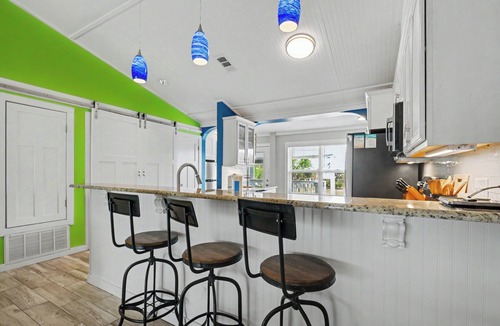 Villa Segunda House | Tranquil covered deck with Gulf views, private pool and easy beach access.