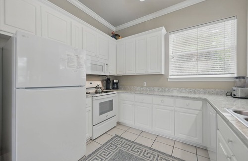 Village of Sugar Beach House | Vacation Starts Poolside–Heated Private Pool & Golf Cart Available