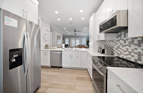 Riviera Beach House | Walk to the Beach | Luxe 4BR Home with Pool + Golf Cart