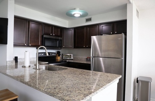 Villa Sabine Condo | Water Views, Perfect Location, Large Pool, Courts and Private Fishing Pier!