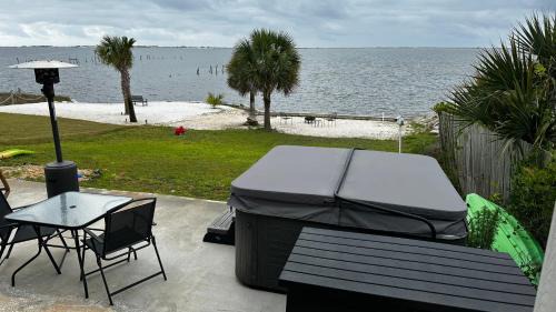 Navarre House | Waterfront Master Suite with Views of Barrier Island