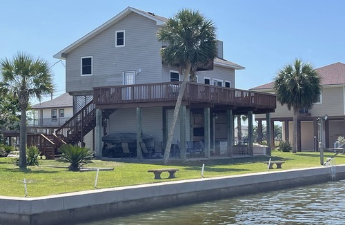Terramar Beach House | Waterfront Terramar Getaway, Amazing Sunsets, Outdoor Bar, Kayak, Beach, Fishing