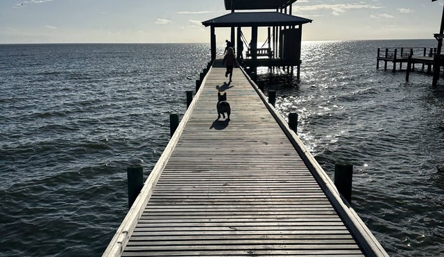 Beautiful, impeccably clean bayfront home with private dock.