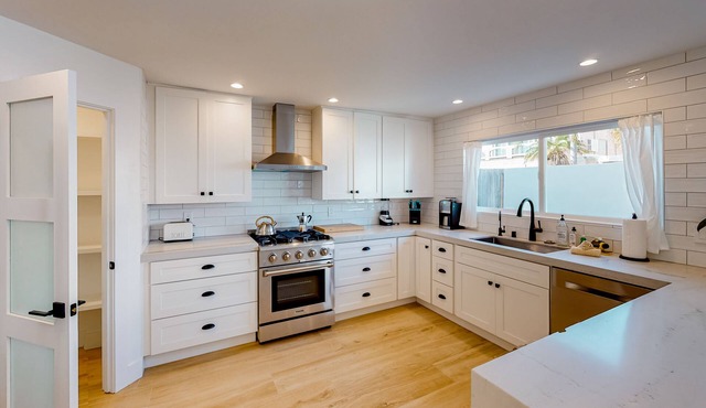 Dazzling, spacious, & completely remodeled home with a chef’s dream kitchen