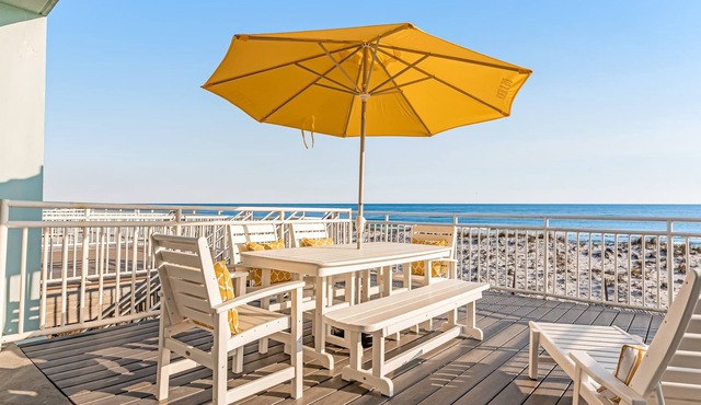Dog-friendly, beachfront dream with a wet bar & two furnished balconies