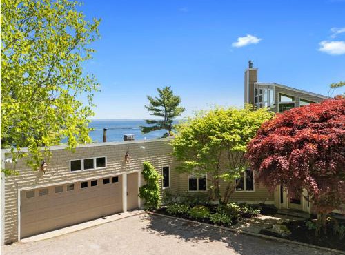 Elegant ocean view home with breathtaking views, private hot tub & large deck