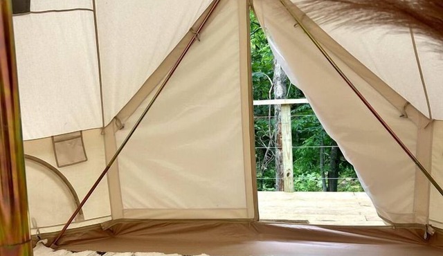 Enchanted Woodland Glamping Tent with Fire Pit & Clubhouse Kitchen Access Near Gentry, Arkansas